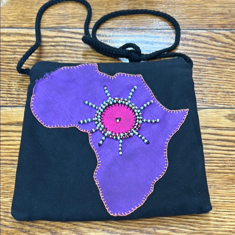 African Map bag style black fabric crossbody. Black, purple and pink